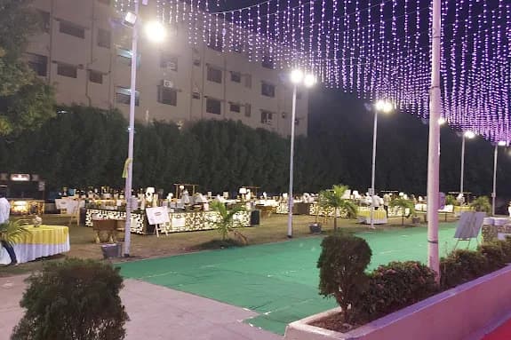The lit grounds outside SS Conventions in the evening