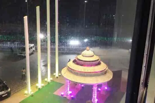 The entrance drive at CK Conventions lit at night